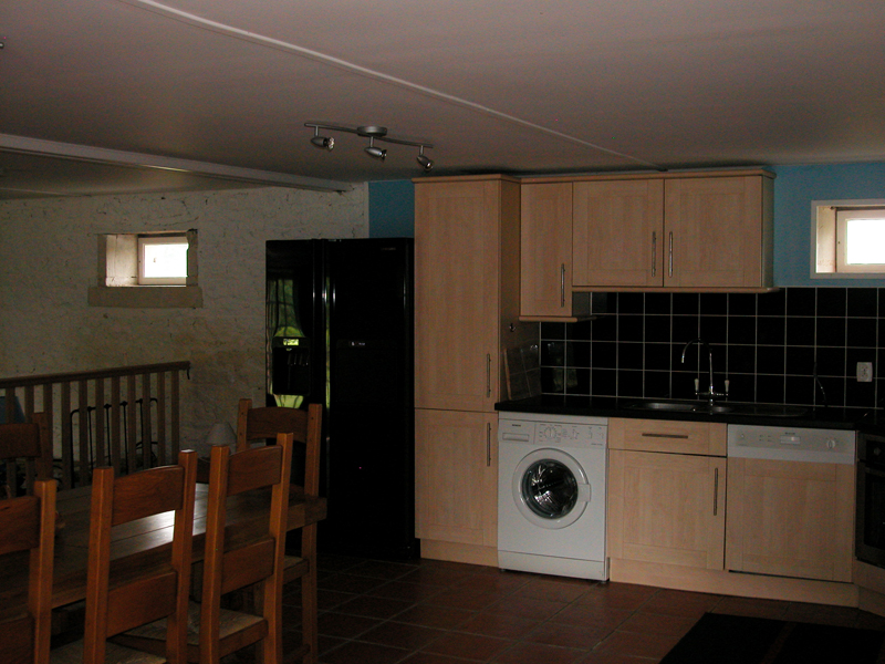 locsaisonniere-manoirdelaize-grange-cuisine.jpg